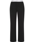 Pantaloni neri in jersey con logo