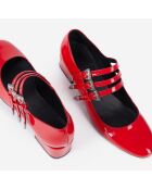 Babies en cuir avec boucles western rouges