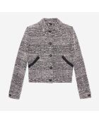 Veste en tweed noire et blanche