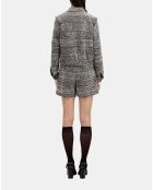 Veste en tweed noire et blanche