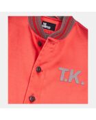 Blouson satiné avec patchs rouge