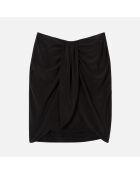 Jupe courte drapée en soie lavée noire