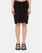 Jupe courte drapée en soie lavée noire