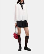 Top écru avec détail en velours blanc cassé