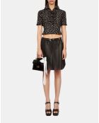 Jupe portefeuille courte en cuir noire