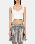 Jupe courte avec rayures et smocks noire et blanche