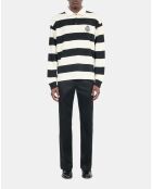 Polo manches longues à rayures noires et blanches