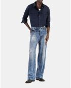 Jean clouté large bleu décoloré