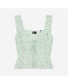 Top fleuri avec volants en soie verts