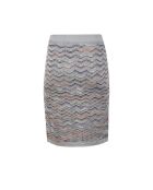 Jupe Nyméria base argentée avec espaces multi-oranges et bleus.teint