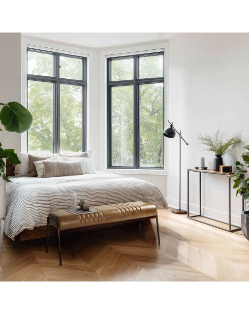 Banc matelassé en cuir marron et pieds acier