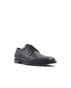 Derbies à lacets en cuir Bastian noires