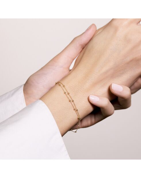 Pulsera en forma de bola de oro amarillo