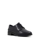 Derbies en cuir Elina noires