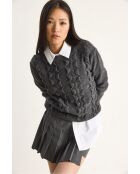 Jersey antracita de punto suave con cuello redondo y volantes