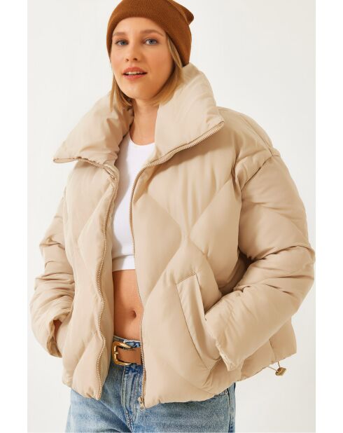 Piumino oversize beige