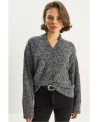 Maglione nero con scollo a V testurizzato