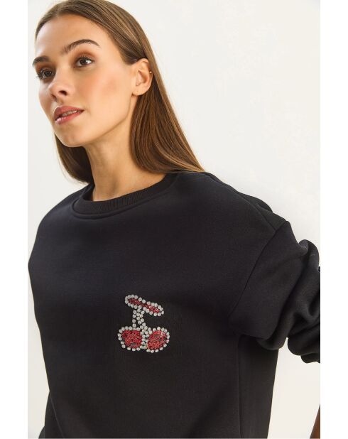 Trui met ronde hals versierd met zwarte kersenstenen