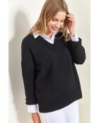 Maglione nero in maglia con scollo a V