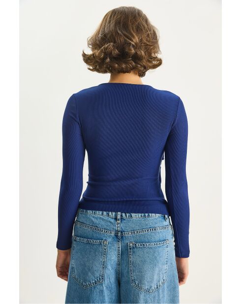 Langärmliges Top mit Wickelkragen mit blaugoldenen Details