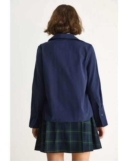 Klassiek geplooid overhemd met marineblauwe manchetdetails