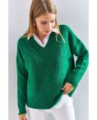 Grüner Strickpullover mit V-Ausschnitt