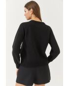 Maglione raglan nero con bottoni