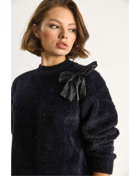 Maglione in morbida maglia con fiocco e dettagli in perle nere
