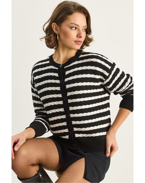 Chaleco de punto a rayas con detalles trenzados negros