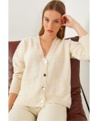 Gilet en maille à col V et poches boutonnées écru