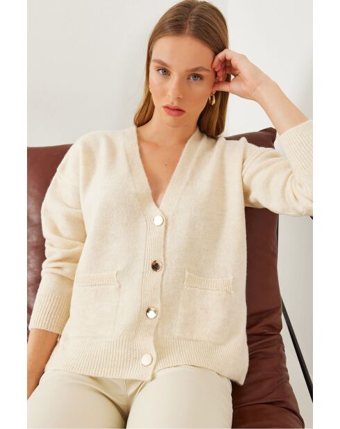 Gilet en maille à col V et poches boutonnées écru