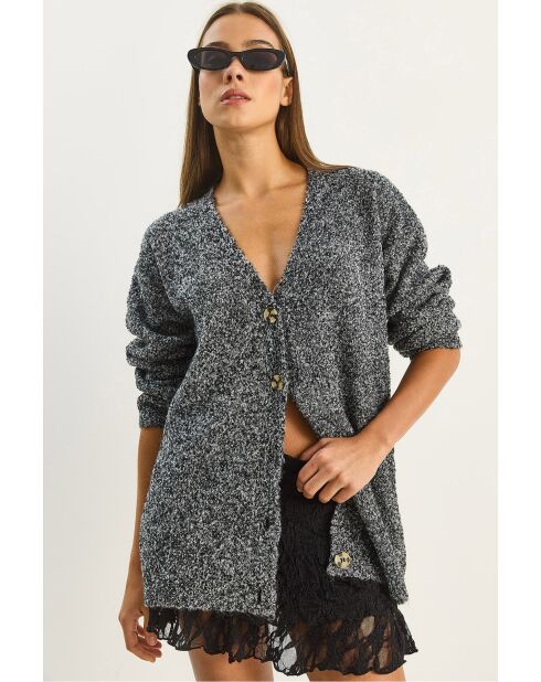 Chaleco extragrande de punto negro con cuello en V y hebilla