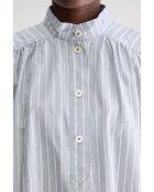 Blusa gris a rayas en forma de pera