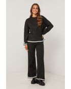 Camille schwarzes Set aus Pullover und Hose