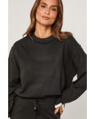 Camille schwarzes Set aus Pullover und Hose