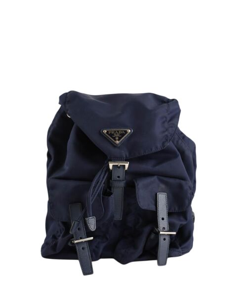 Sacs à Dos en synthétique marine - 32x12x27 cm - Bon état