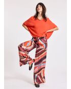 Orangefarbener Pom Pullover