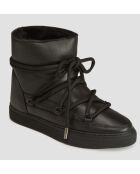 Schwarze Schneestiefel mit Lammfellfutter