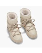 Cremefarbene Schneestiefel mit Lammfellfutter