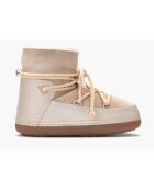 Beigefarbene Schneestiefel mit Lammfellfutter
