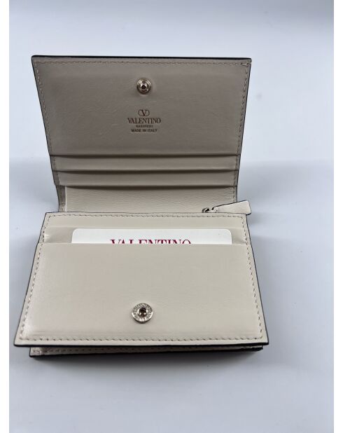 Estuche Rockstud color crema, 11 x 8 x 3 cm, nuevo estado