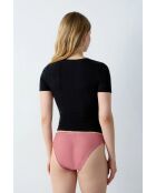 Geheimes Weihnachtsmannhöschen mit rosafarbenem Hintergrund