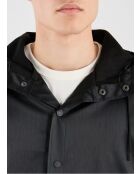 Lange zwarte regenjas van Melanie