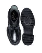 Bottes hautes à boucle en cuir noires