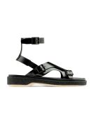 Tropezianische Sandalen aus schwarzem Kalbsleder