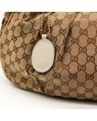 Le Sukey Gucci beige - Bon état avec griffures sur le canevas GG