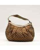 Le Sukey Gucci beige - Bon état avec griffures sur le canevas GG