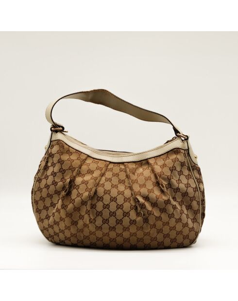 Le Sukey Gucci beige - Bon état avec griffures sur le canevas GG