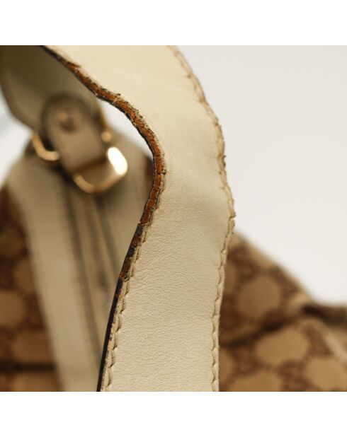 Le Sukey Gucci beige - Bon état avec griffures sur le canevas GG