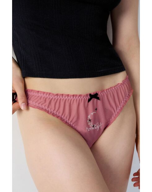 Secret Santa slipje met roze achtergrond